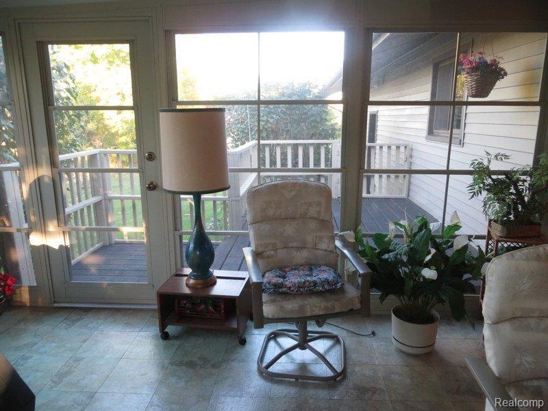 4745 East Allen Road Howell, MI 48855 - Photo 11 of 23 Deck of Sun Room East side.JPG