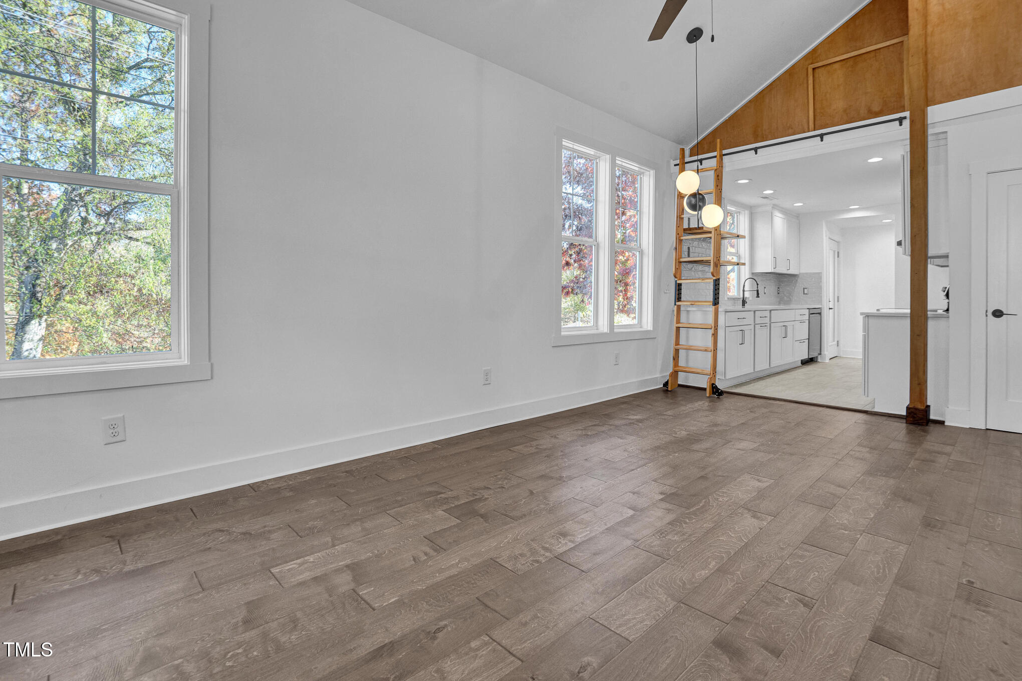 518 Worth Street Raleigh, NC 27601 - Photo 6 of 32 a view of an empty room with a window