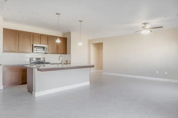 a large kitchen with cabinets
