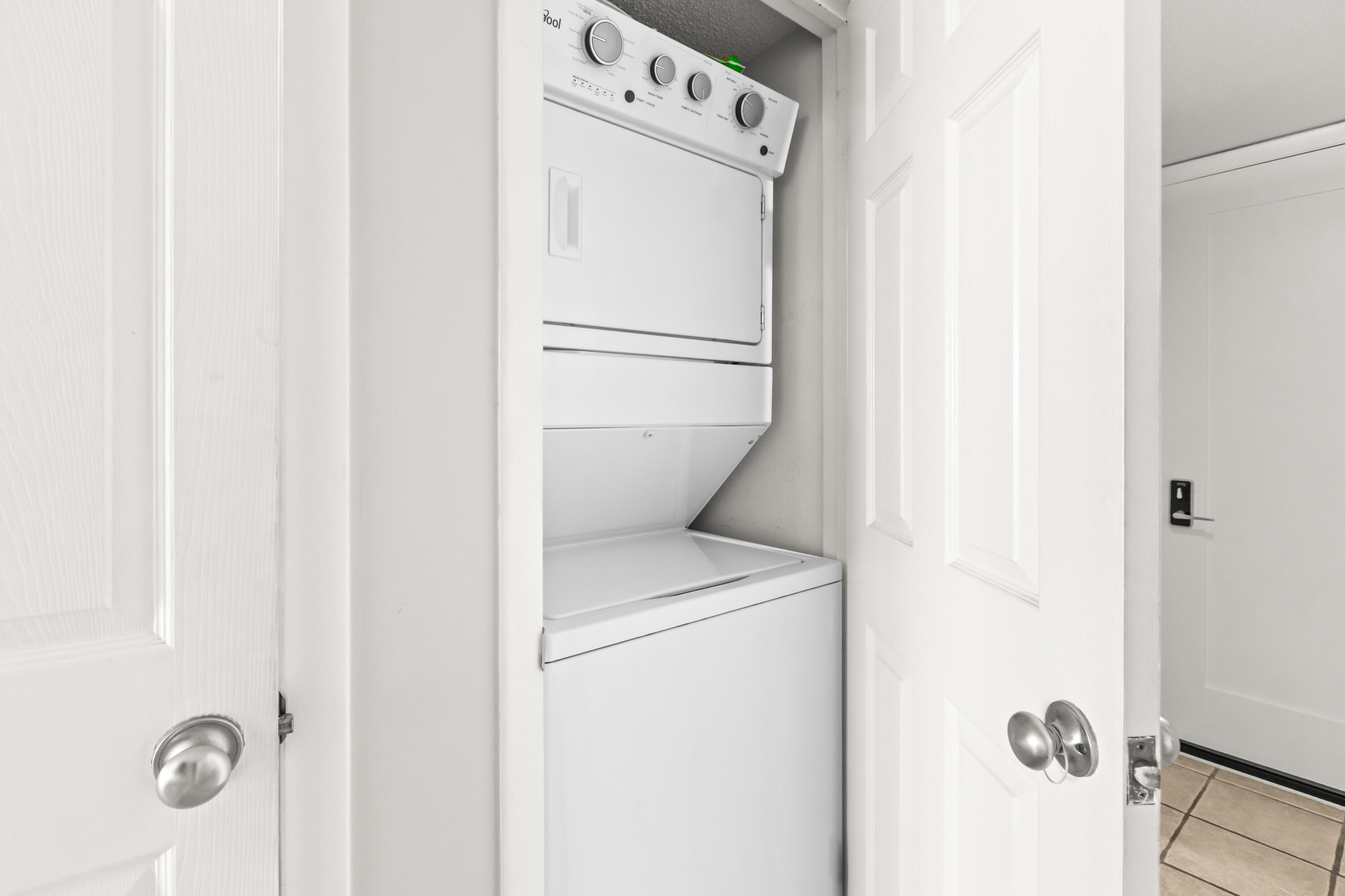 4100 East County Highway 30A, Unit 1604 Santa Rosa Beach, FL 32459 - Photo 13 of 43 a utility room with dryer and washer