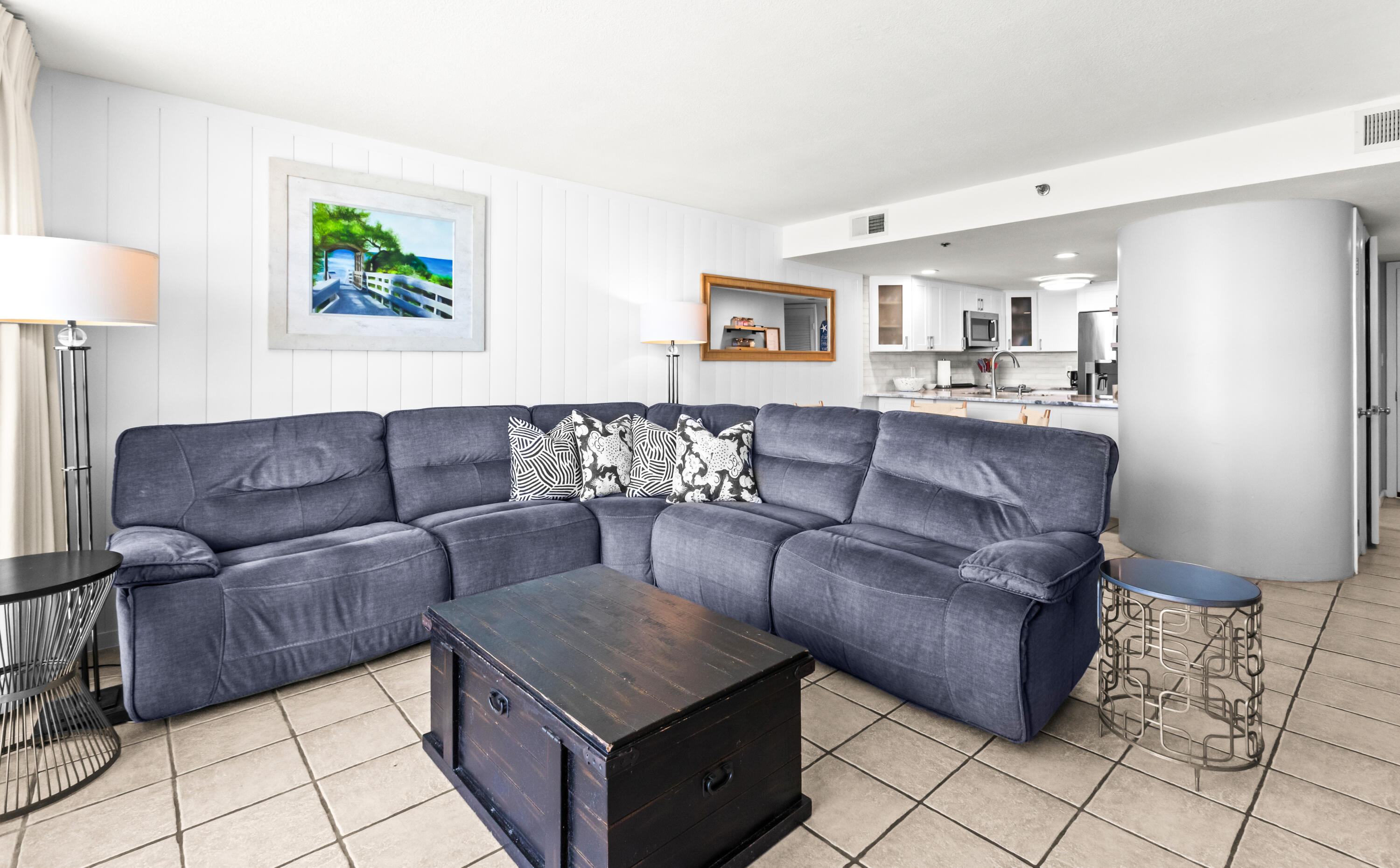 4100 East County Highway 30A, Unit 1604 Santa Rosa Beach, FL 32459 - Photo 16 of 43 a living room with furniture and a lamp