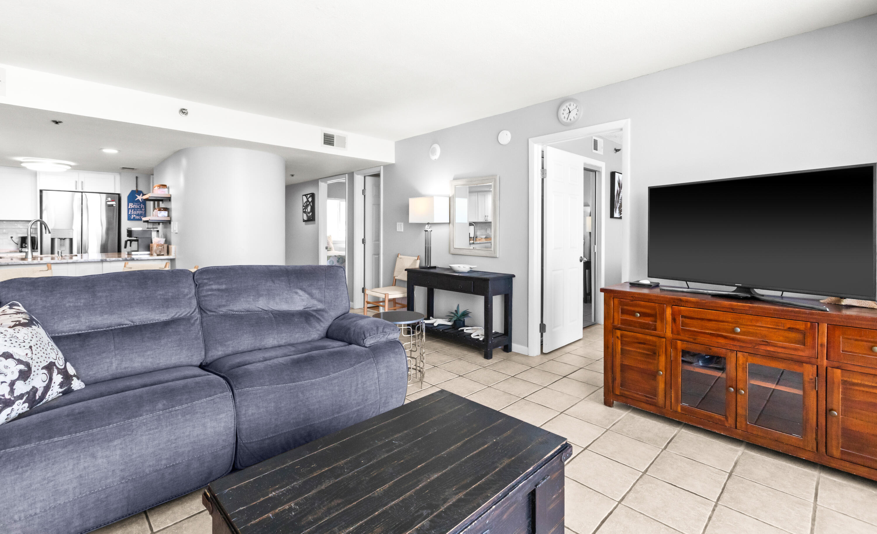 4100 East County Highway 30A, Unit 1604 Santa Rosa Beach, FL 32459 - Photo 19 of 43 a living room with furniture and a flat screen tv