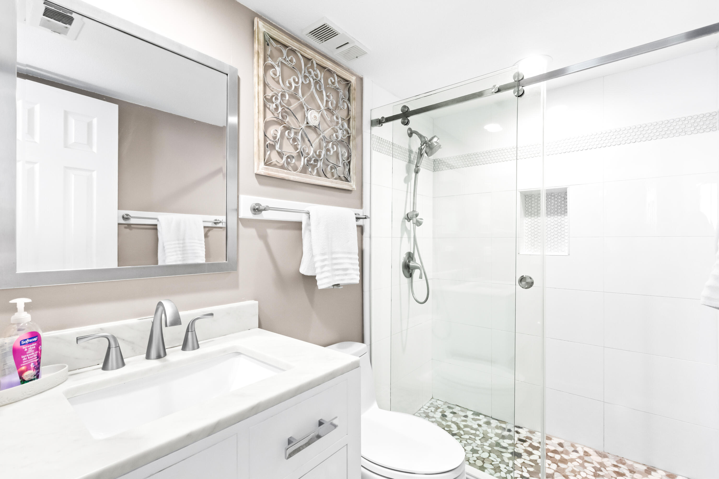 4100 East County Highway 30A, Unit 1604 Santa Rosa Beach, FL 32459 - Photo 22 of 43 a bathroom with a sink vanity granite toilet and shower