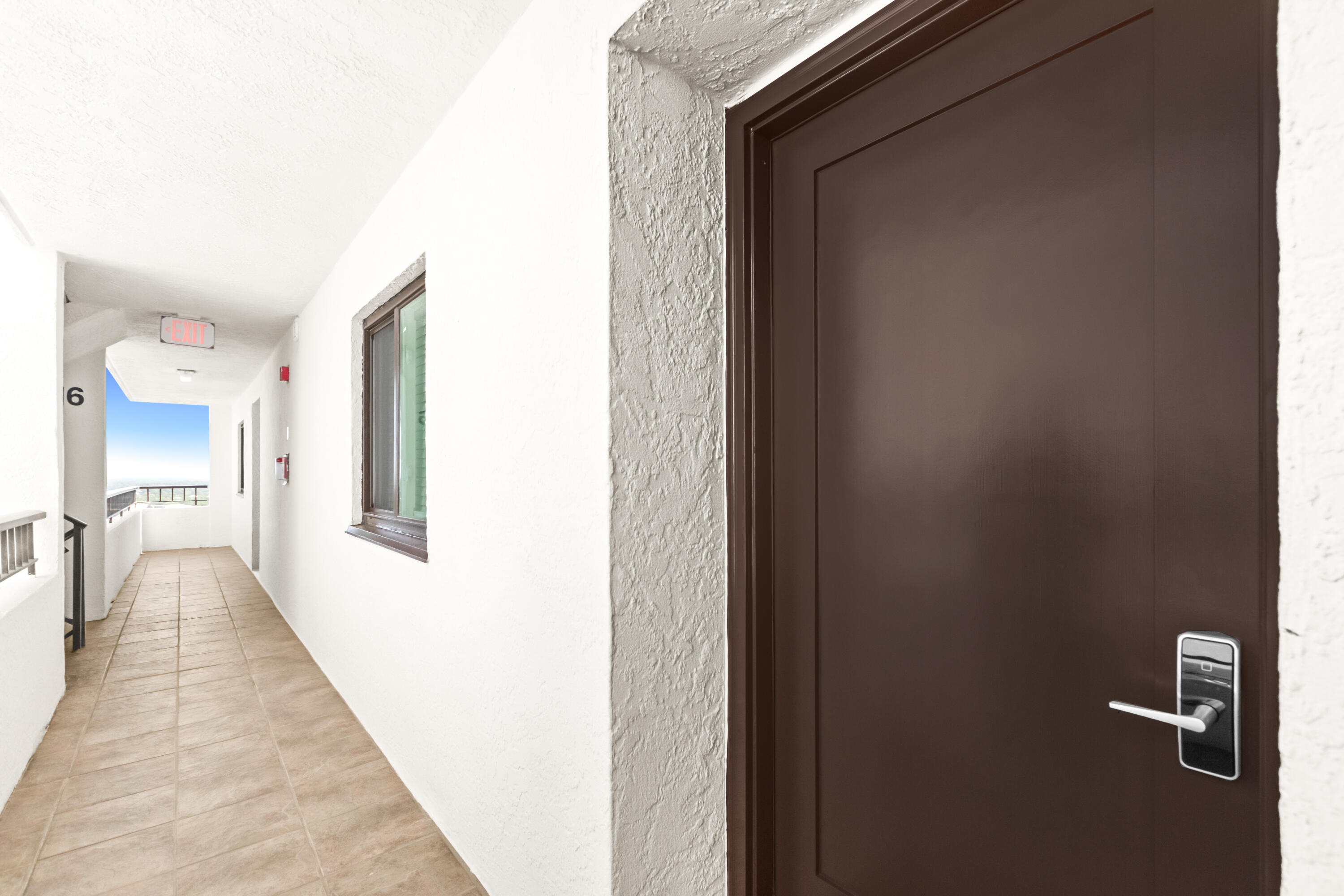 4100 East County Highway 30A, Unit 1604 Santa Rosa Beach, FL 32459 - Photo 7 of 43 a view of a hallway with a closet