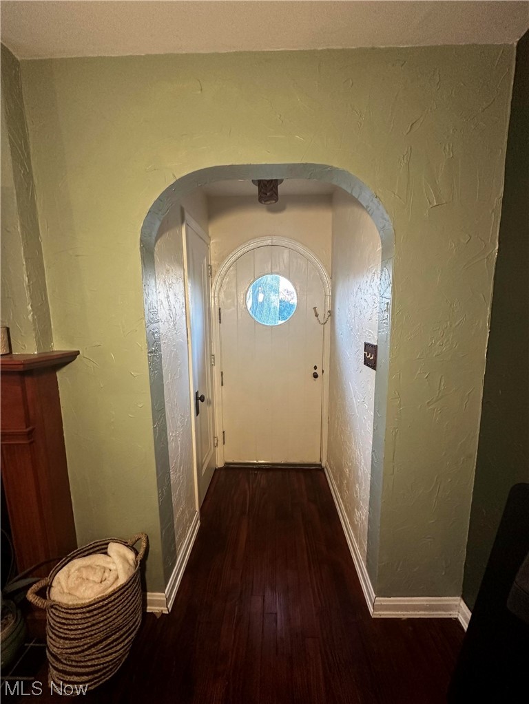 2444 Manchester Road Akron, OH 44314 - Photo 16 of 26 Hallway featuring dark hardwood / wood-style flooring