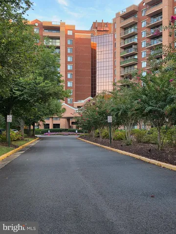a city street lined with tall buildings