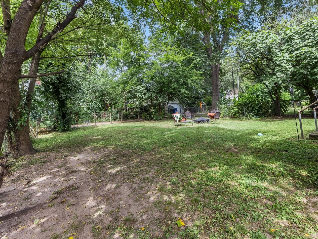 508 Tilden Street, Unit 1 Raleigh, NC 27605 - Photo 4 of 16 a view of a park with large trees