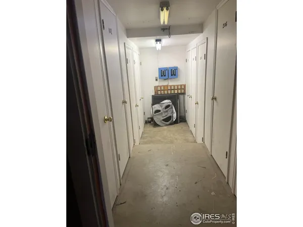 a view of a hallway and a livingroom