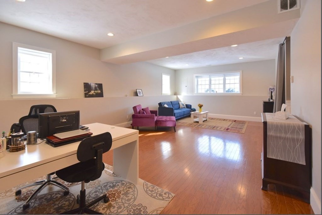 261 Main Street, Unit 1 Shrewsbury, MA 01545 - Photo 12 of 14 a living room with furniture