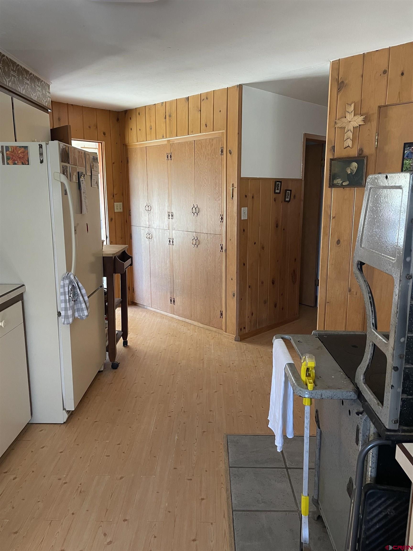 21439 2300th Road Cedaredge, CO 81413 - Photo 13 of 20 a view of room with furniture and refrigerator