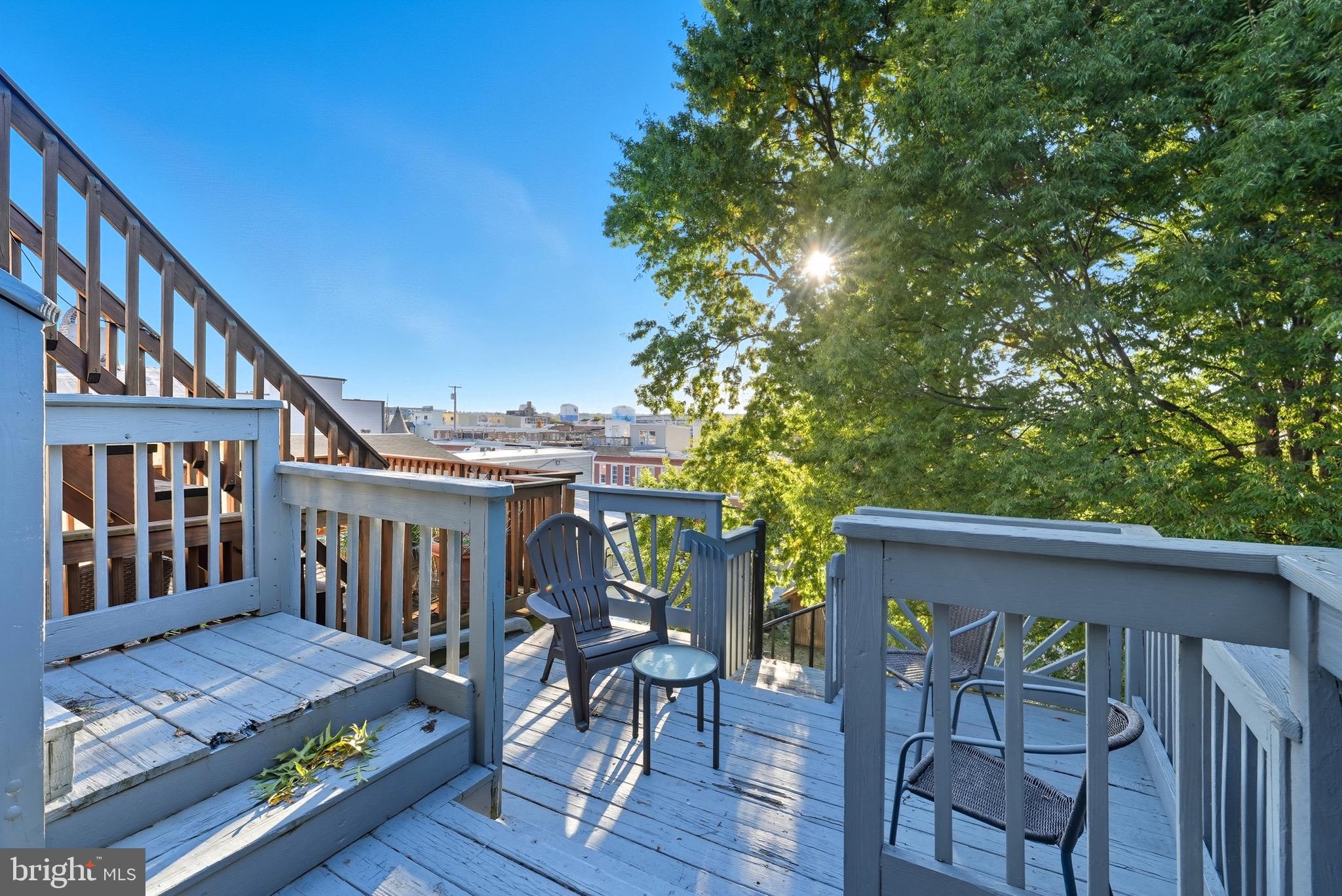 1412 Light Street, Unit 3 Baltimore, MD 21230 - Photo 17 of 23 a view of an chairs and table in the balcony