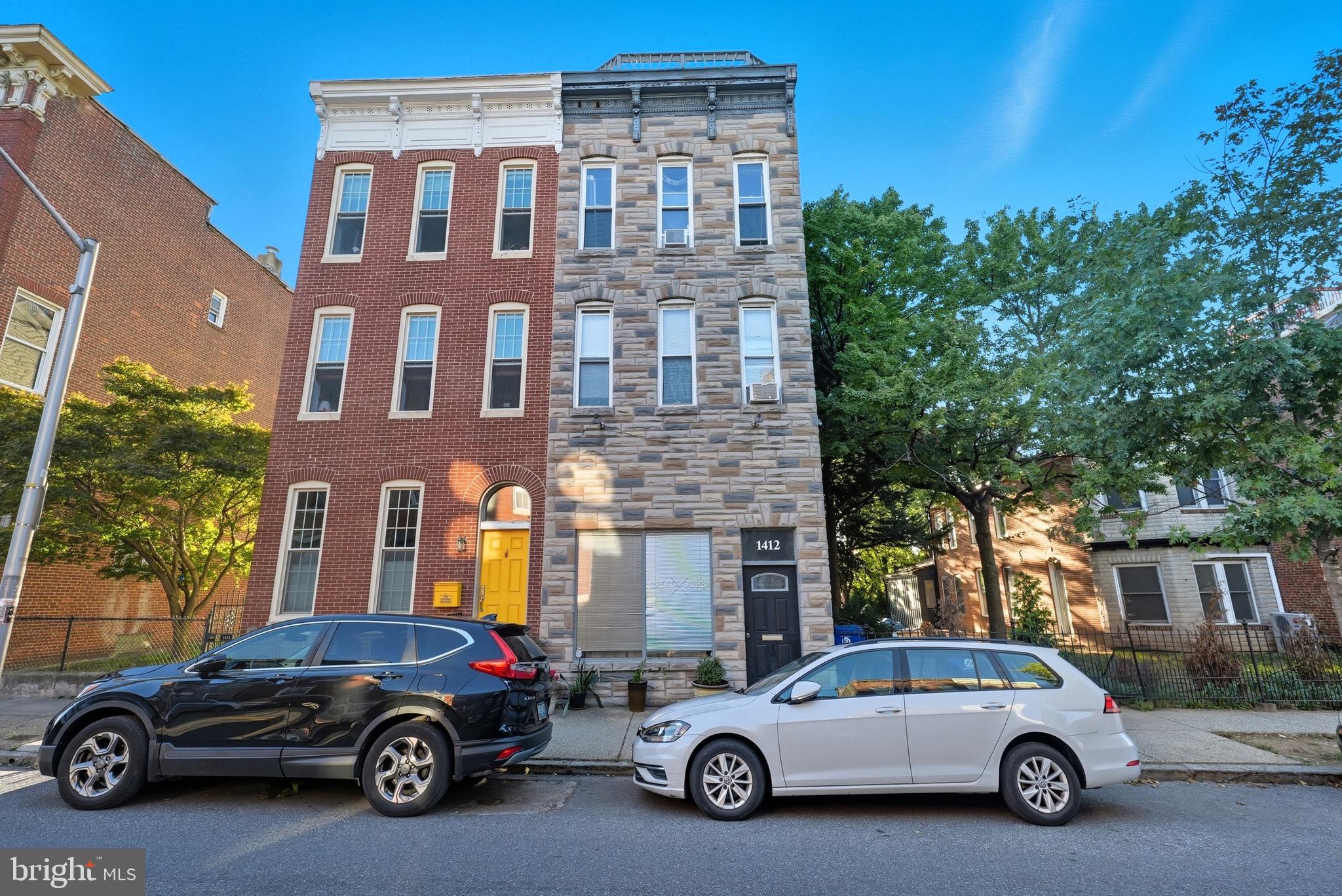 1412 Light Street, Unit 3 Baltimore, MD 21230 - Photo 2 of 23 a car parked in front of a house