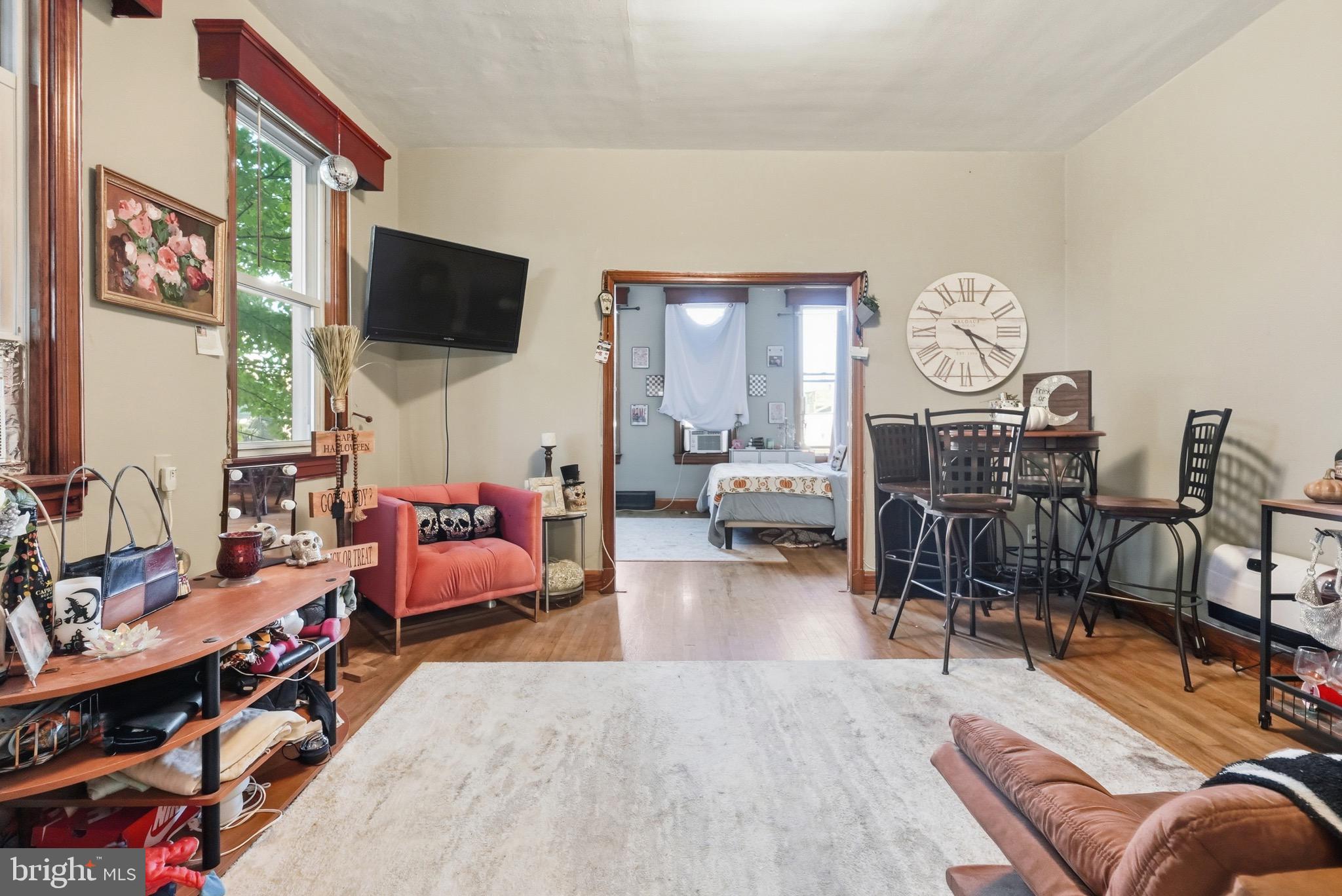 1412 Light Street, Unit 3 Baltimore, MD 21230 - Photo 6 of 23 a living room with furniture and a flat screen tv