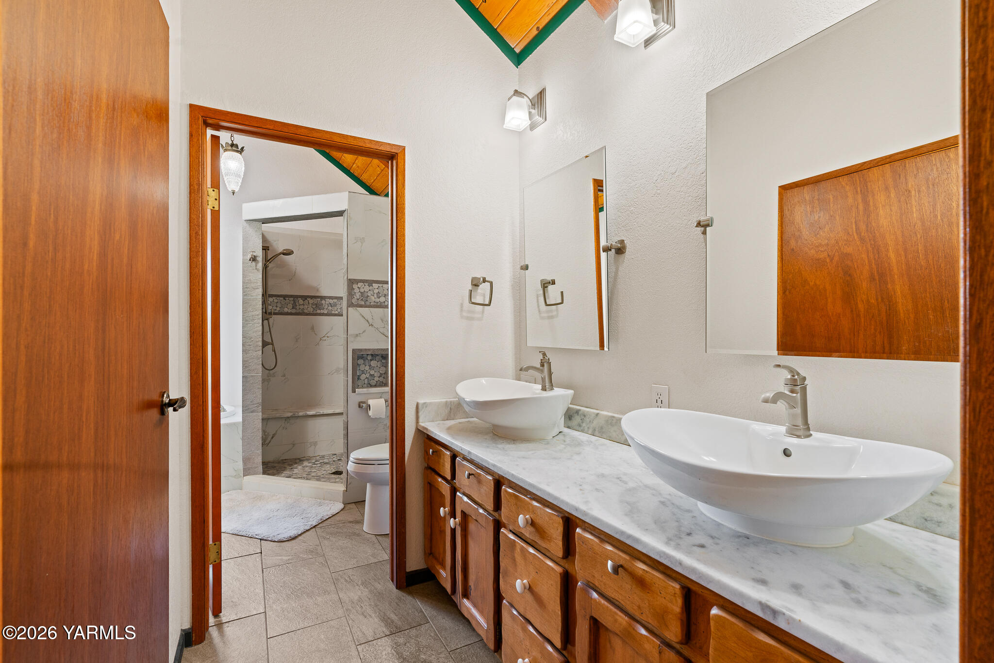 13619 Summitview Ext Road Yakima, WA 98908 - Photo 32 of 56 a bathroom with a sink and a mirror
