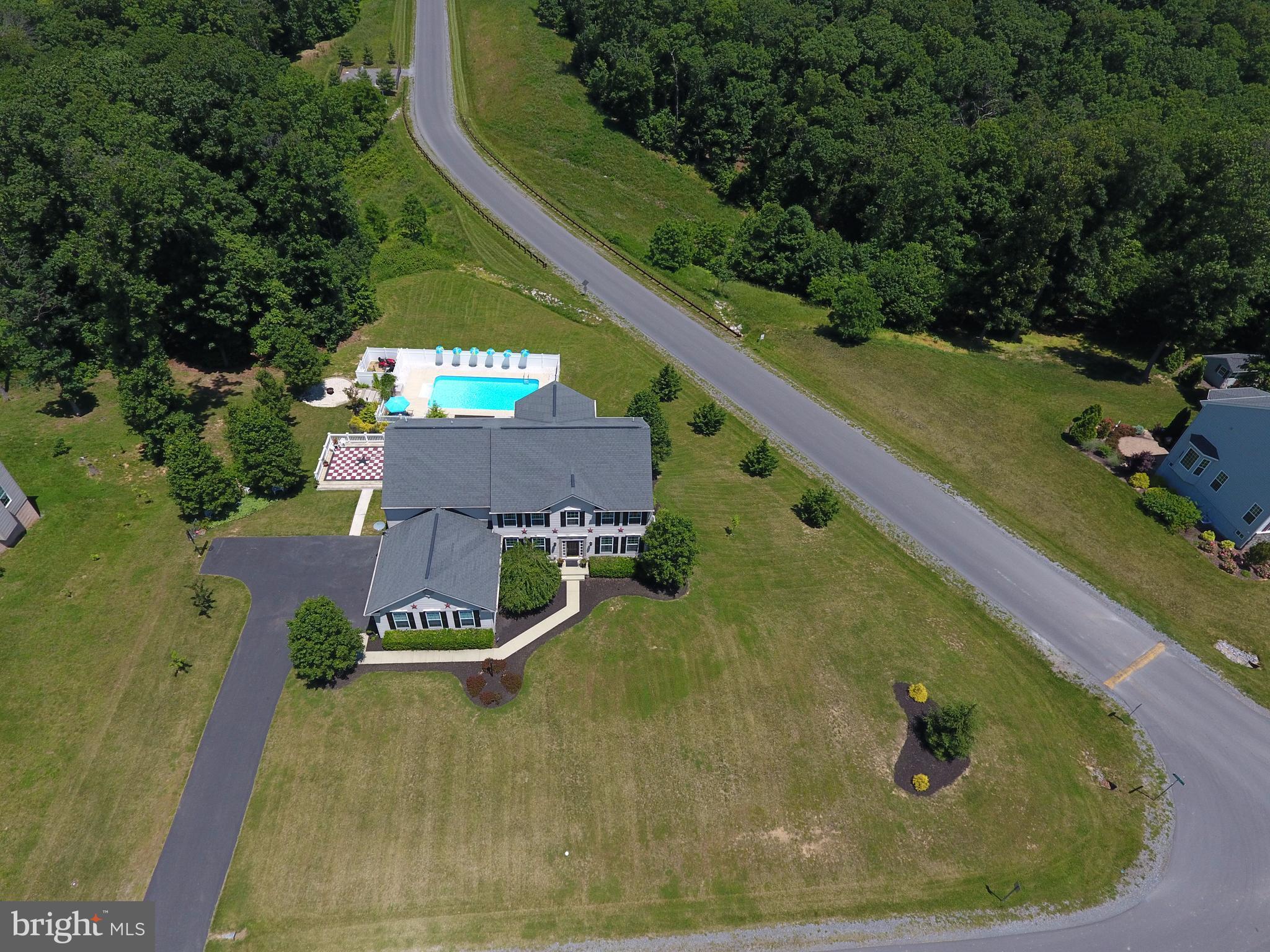 283 Rippling Waters Way Falling Waters, WV 25419 - Photo 1 of 30 an aerial view of a house with outdoor space tennis court