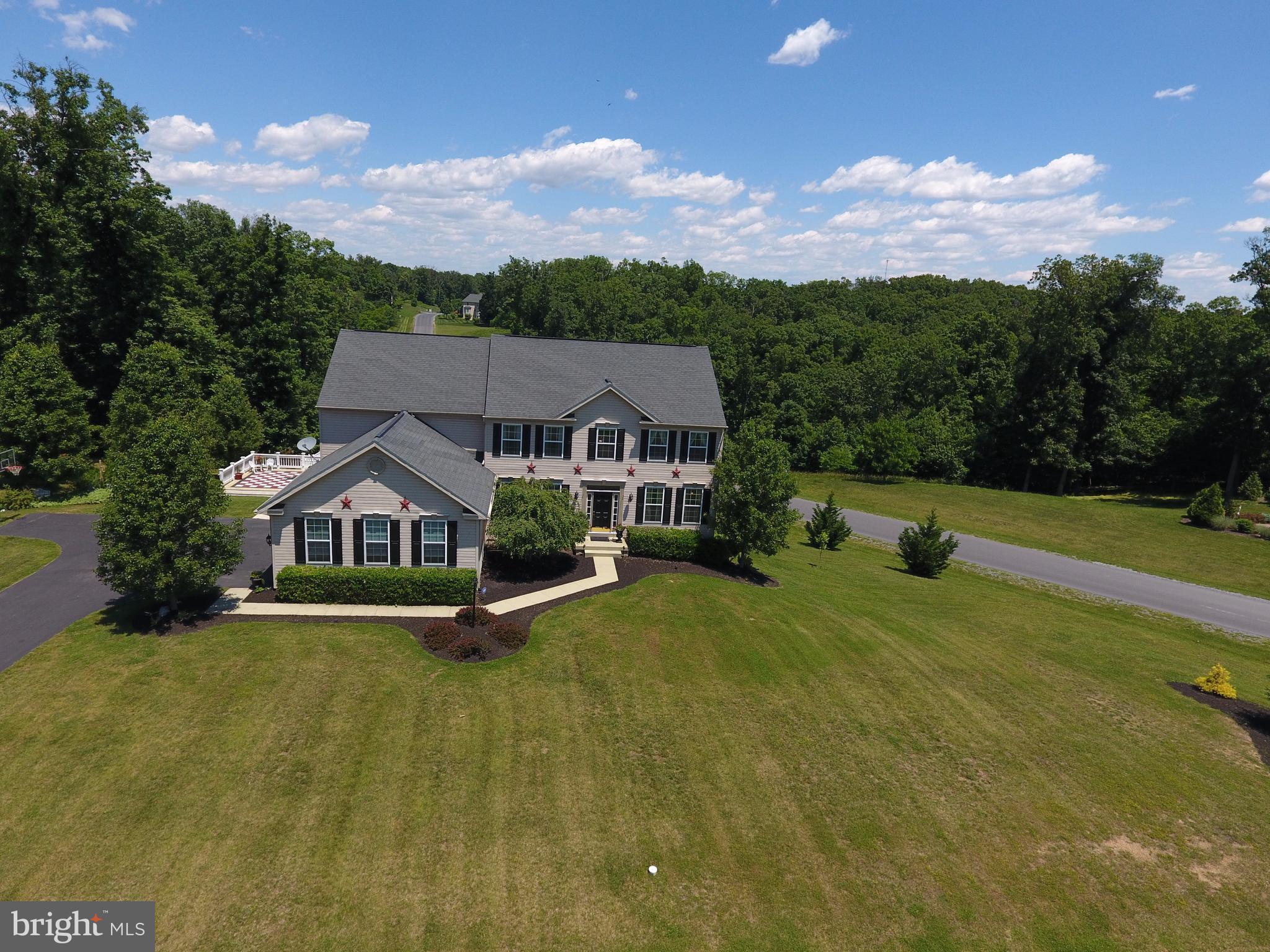 283 Rippling Waters Way Falling Waters, WV 25419 - Photo 2 of 30 an aerial view of a house with a yard