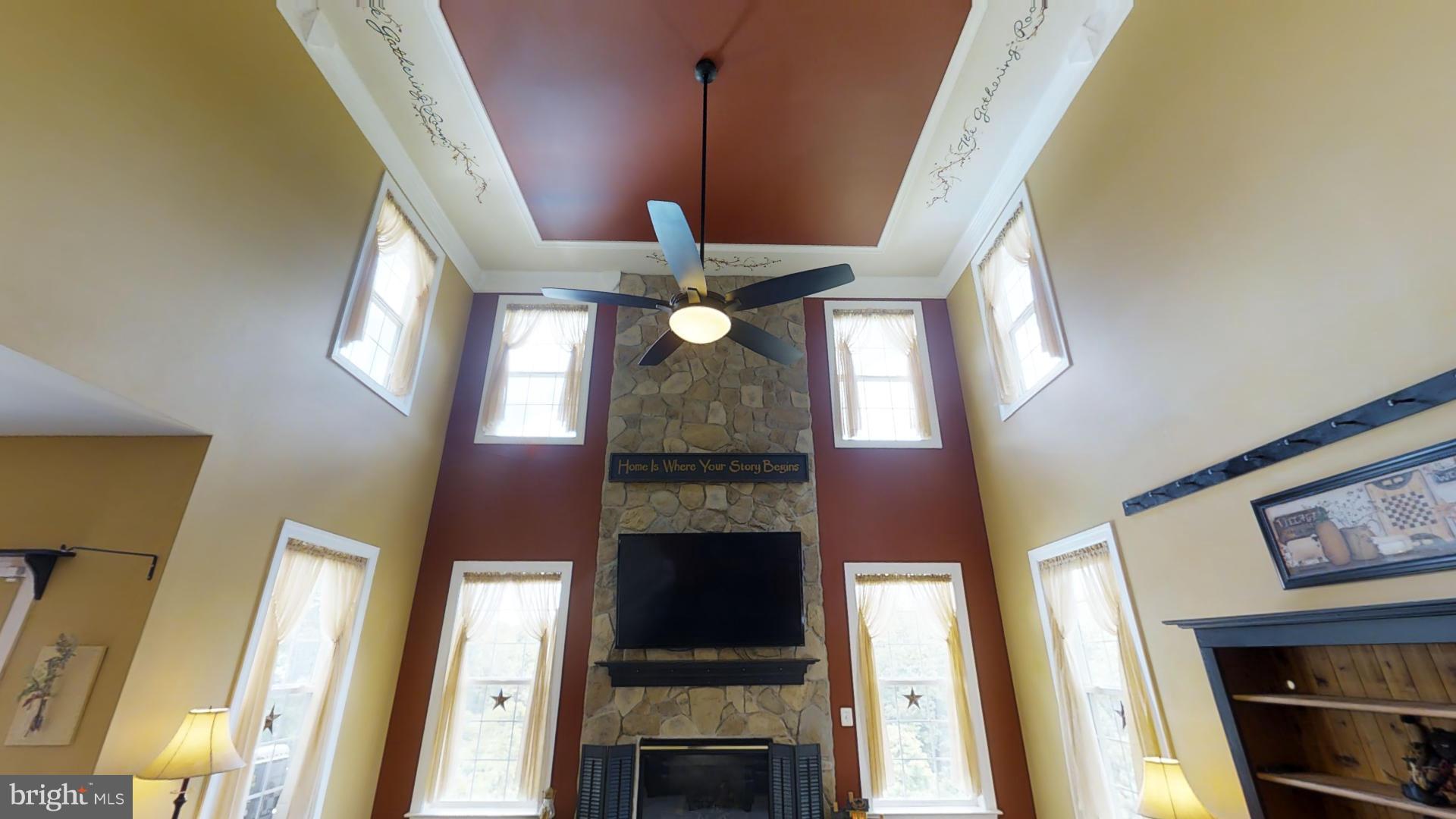 283 Rippling Waters Way Falling Waters, WV 25419 - Photo 15 of 30 a view of a livingroom with furniture staircase and front door