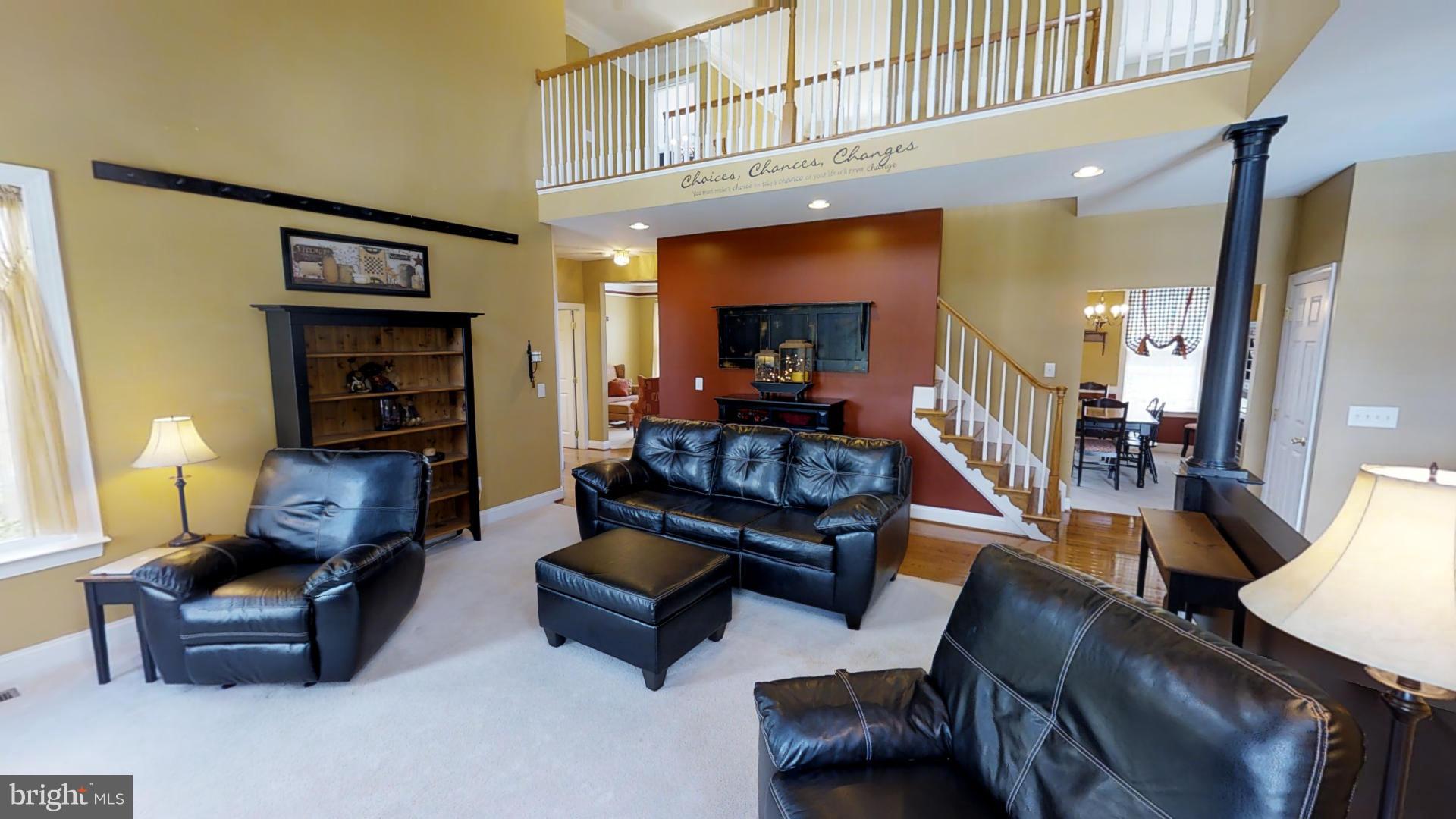 283 Rippling Waters Way Falling Waters, WV 25419 - Photo 16 of 30 a living room with furniture