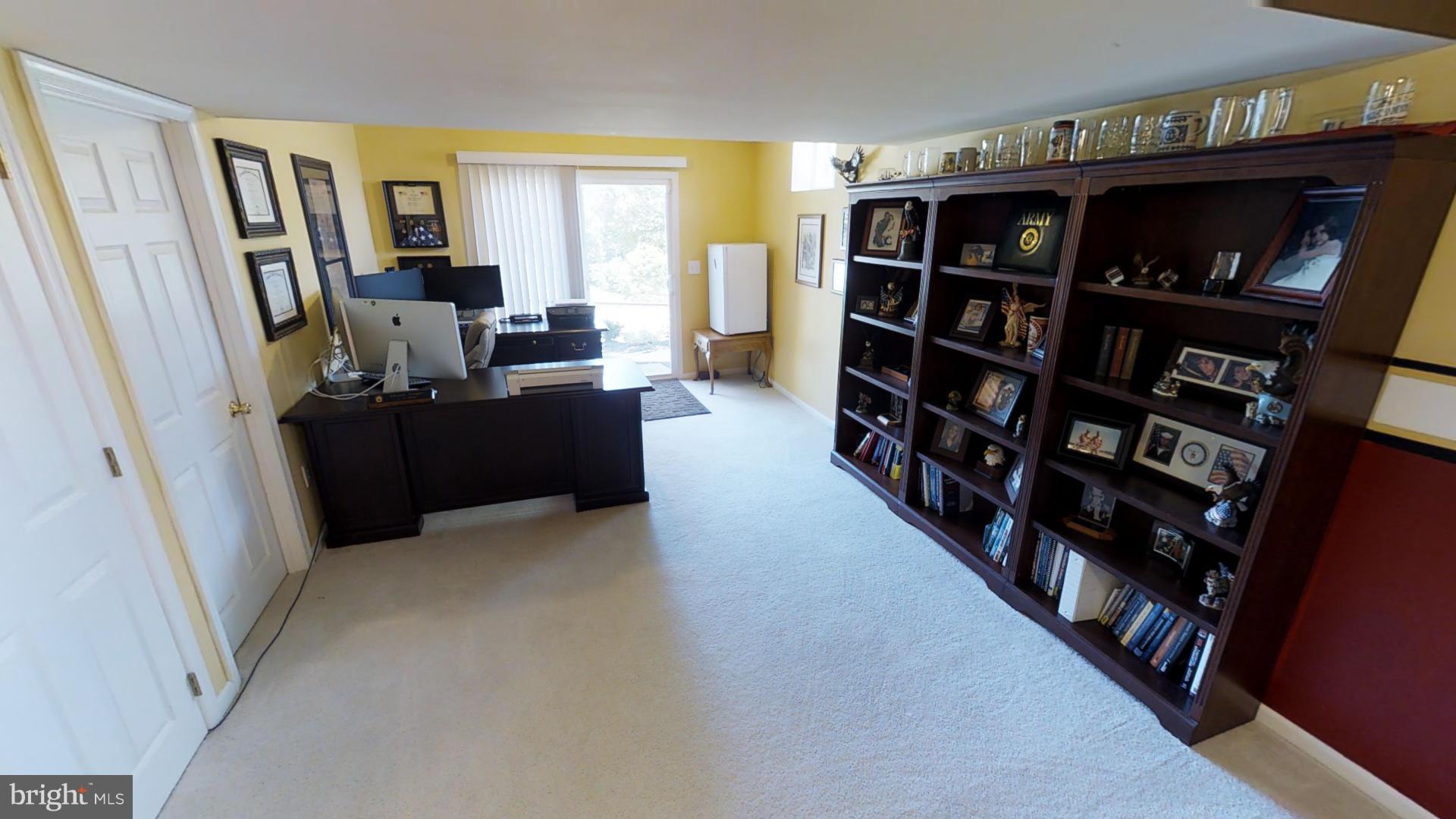 283 Rippling Waters Way Falling Waters, WV 25419 - Photo 20 of 30 a view of a livingroom with furniture and staircase