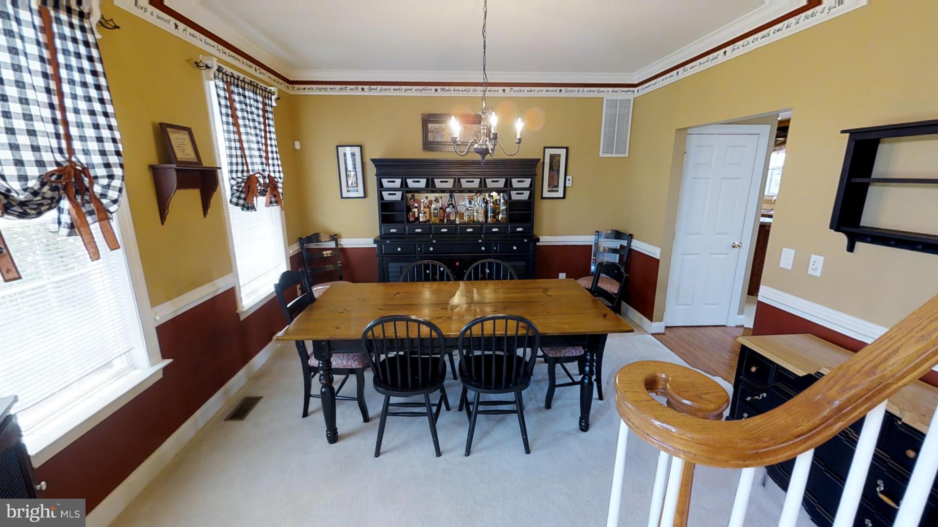283 Rippling Waters Way Falling Waters, WV 25419 - Photo 9 of 30 a view of a dining room with furniture and window
