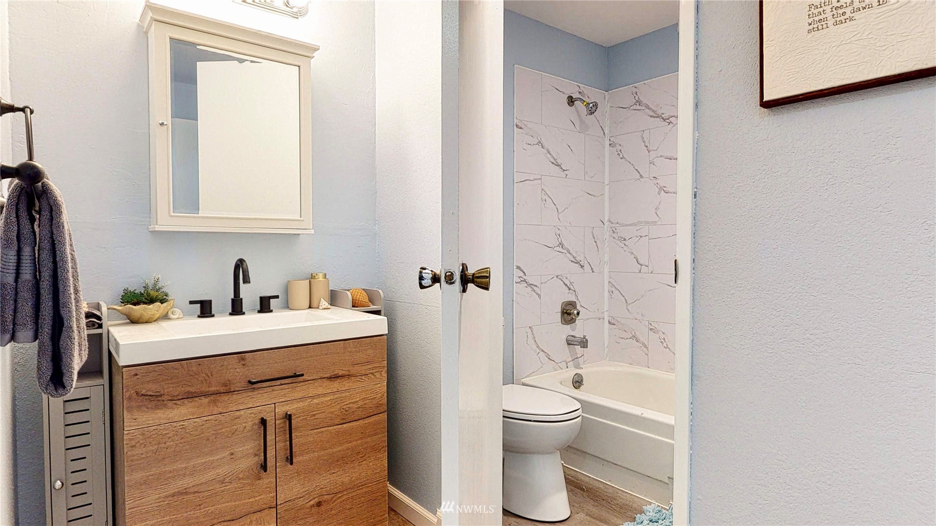 820 Cady Road, Unit C304 Everett, WA 98203 - Photo 12 of 23 a bathroom with a sink toilet and shower