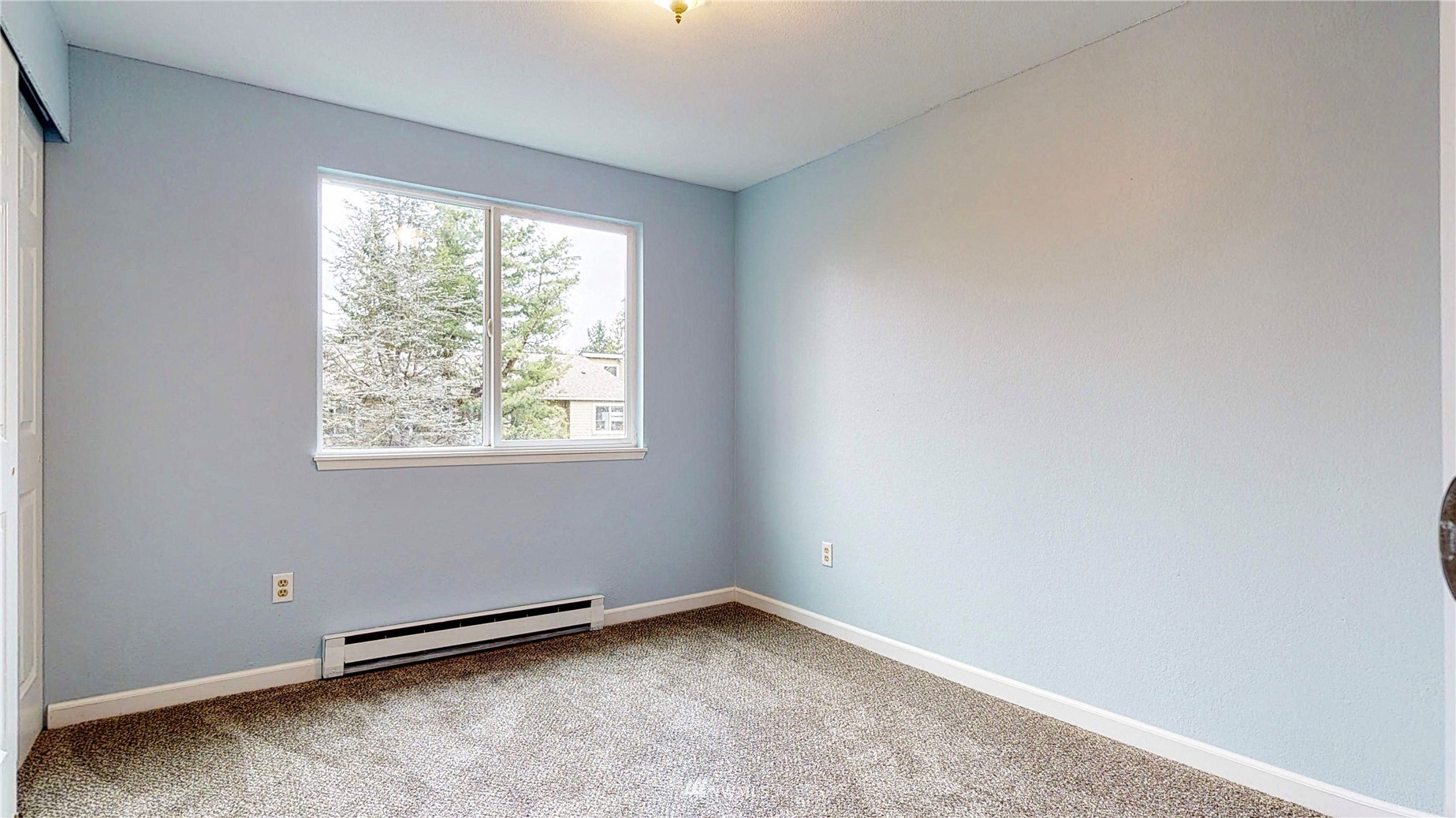 820 Cady Road, Unit C304 Everett, WA 98203 - Photo 15 of 23 an empty room with a window