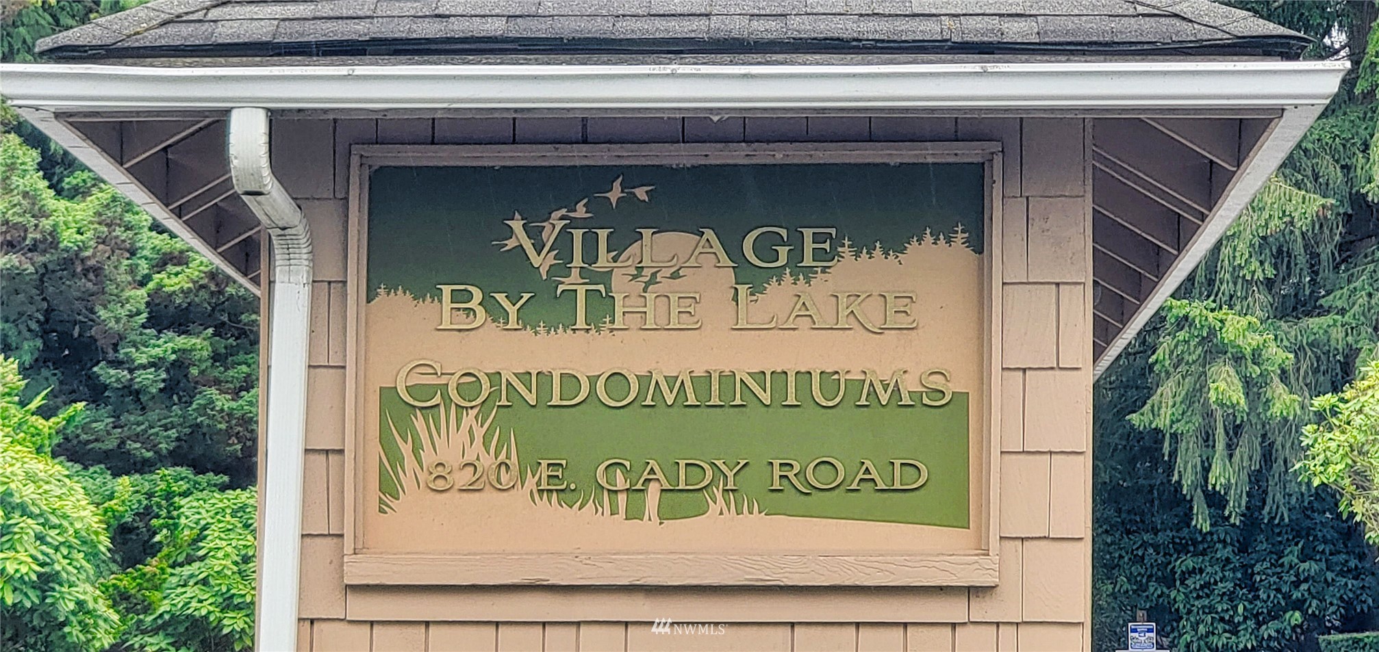 820 Cady Road, Unit C304 Everett, WA 98203 - Photo 23 of 23 a sign on the side of a building
