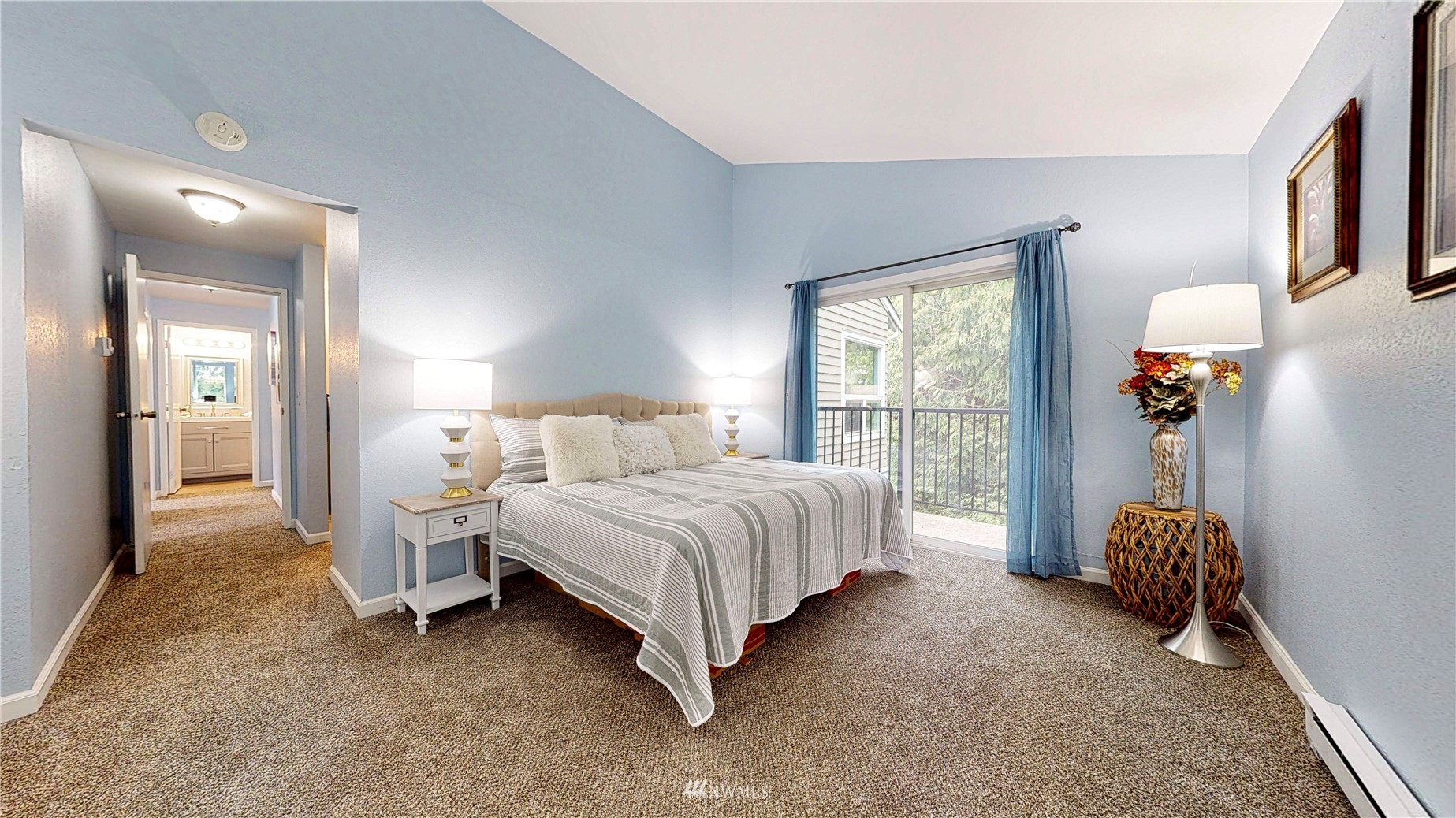 820 Cady Road, Unit C304 Everett, WA 98203 - Photo 9 of 23 a spacious bedroom with a bed and a window