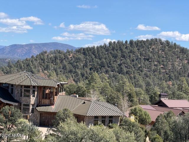 704 South Prestwick, Unit 140 Payson, AZ 85541 - Photo 29 of 59 an aerial view of house with yard and mountain view in back