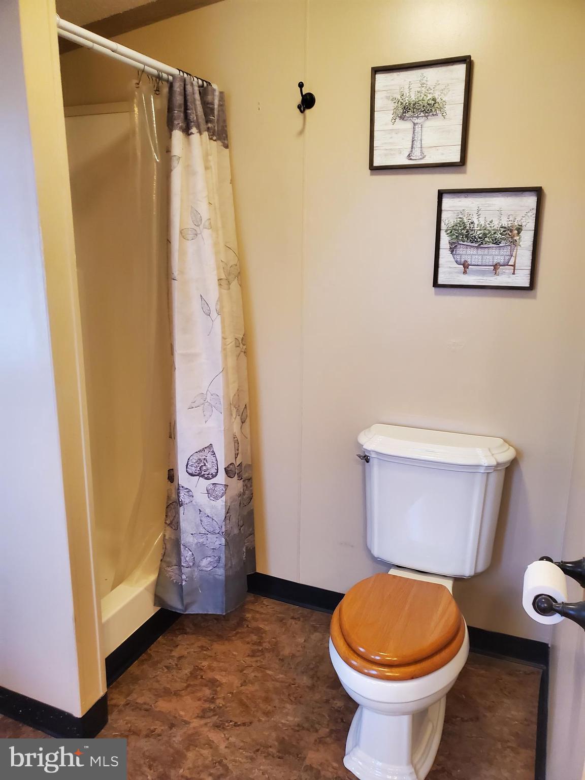 5872 Limeville Road Gap, PA 17527 - Photo 7 of 8 a bathroom with a toilet and a shower