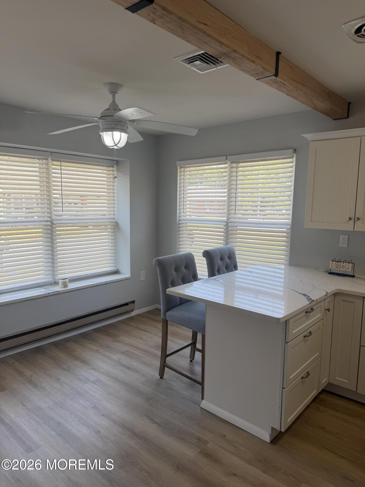 31 Homestead Drive, Unit A Whiting, NJ 08759 - Photo 15 of 23 a view of a kitchen area with furniture and wooden floor