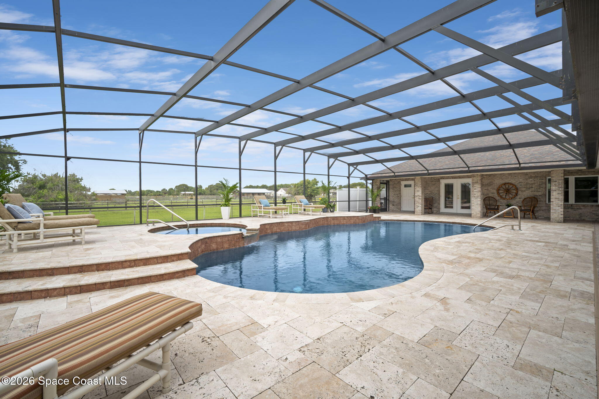 3125 Davis Road Mims, FL 32754 - Photo 30 of 47 a view of a swimming pool with a patio