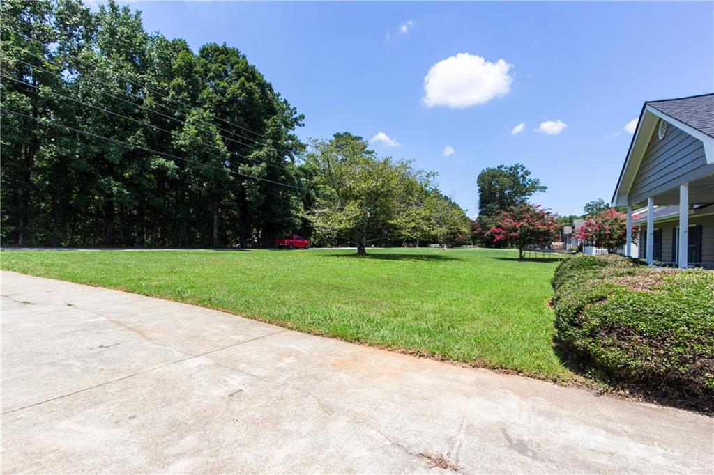 374 McGiboney Road Covington, GA 30016 - Photo 2 of 29 a view of a volley ball court