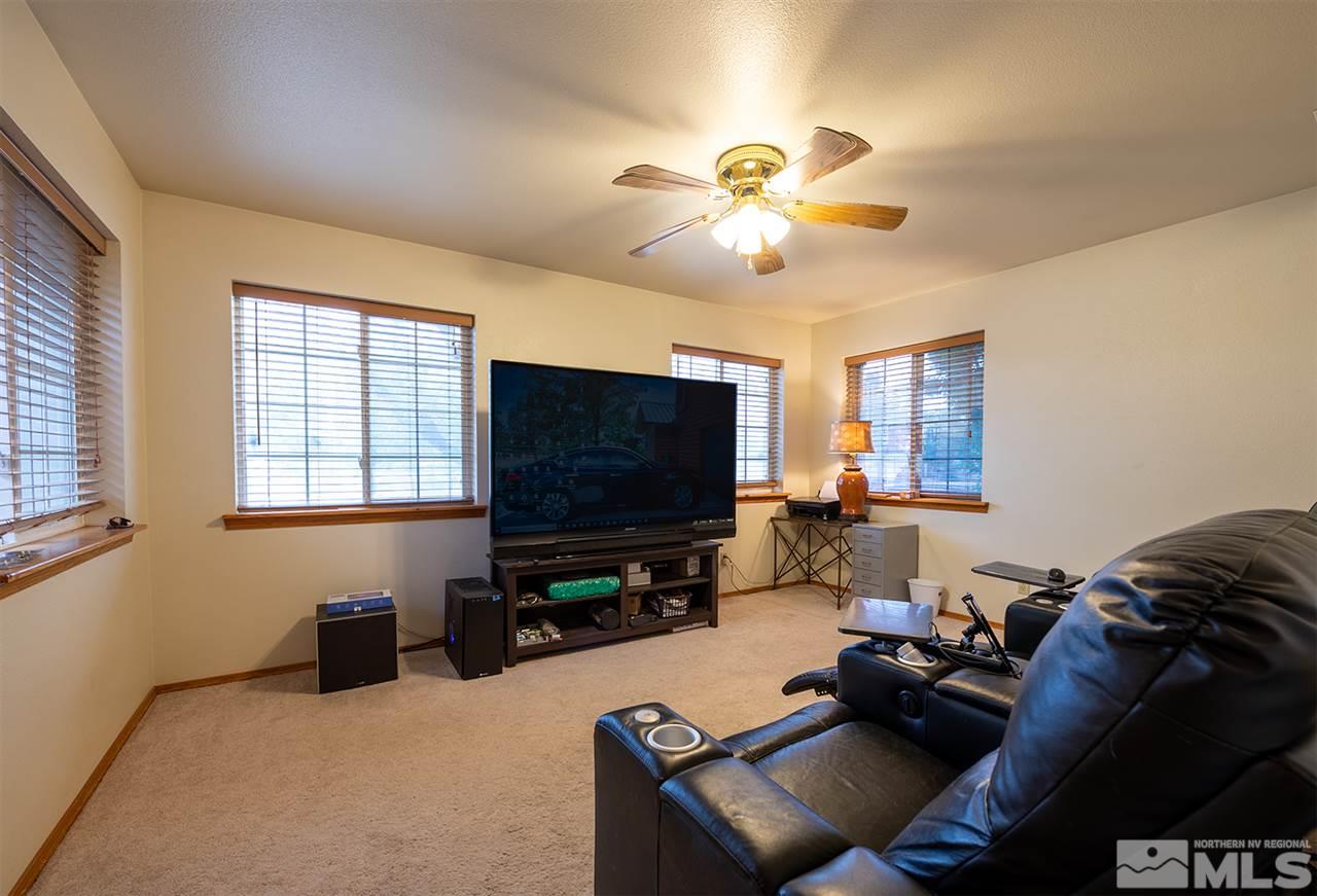 3318 Bottom Road Fallon, NV 89406 - Photo 11 of 23 a living room with furniture and a flat screen tv