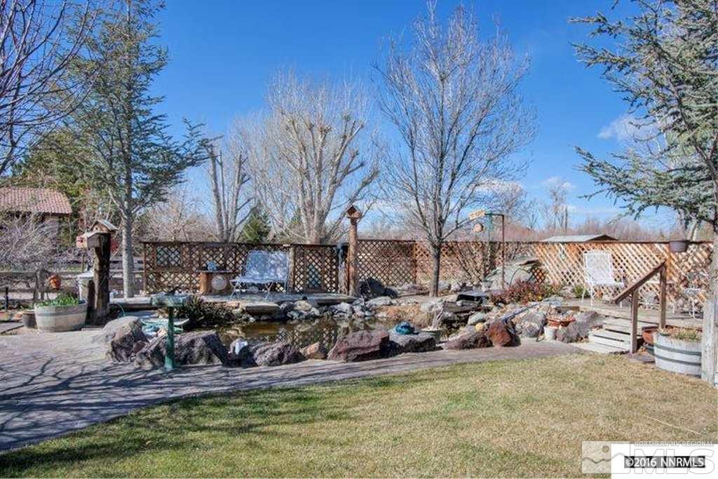 3318 Bottom Road Fallon, NV 89406 - Photo 15 of 23 a view of a swimming pool with a patio