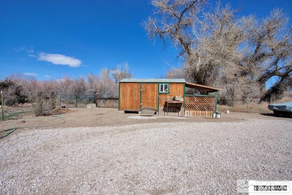 3318 Bottom Road Fallon, NV 89406 - Photo 17 of 23 a view of a house with a yard
