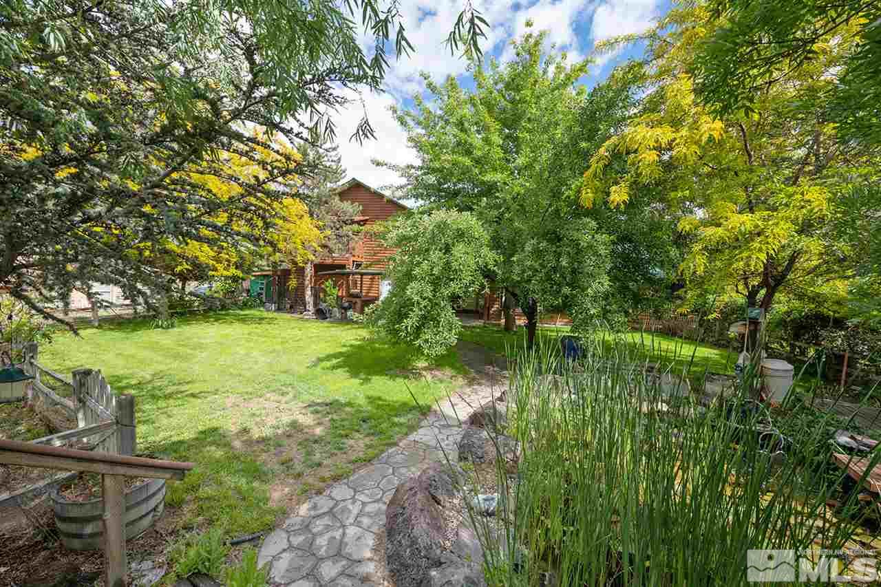3318 Bottom Road Fallon, NV 89406 - Photo 22 of 23 a backyard of a house with lots of green space