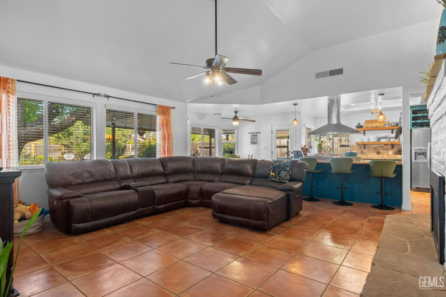 Undisclosed Address Bakersfield, CA 93311 - Photo 20 of 69 a living room with furniture and a large window