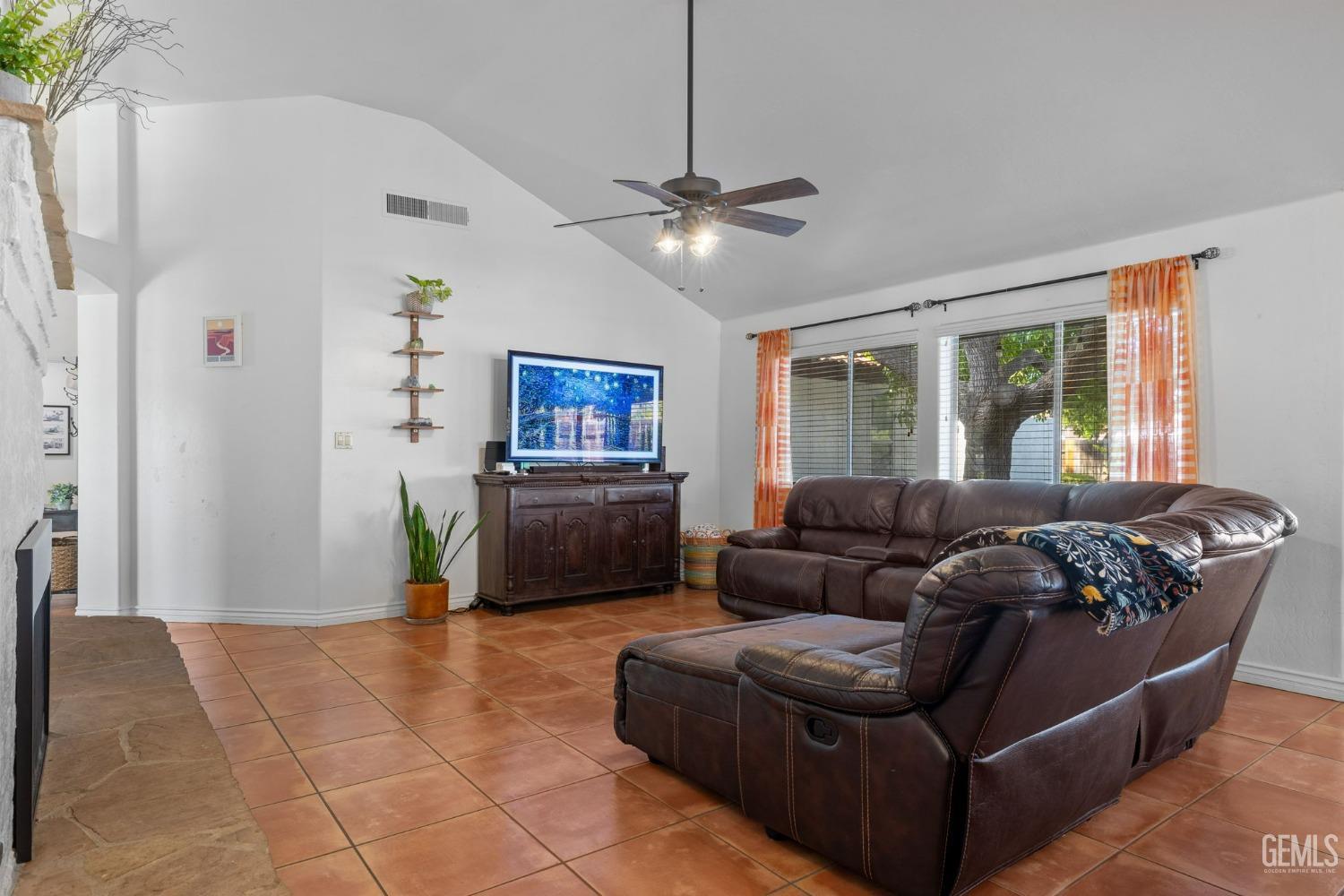 Undisclosed Address Bakersfield, CA 93311 - Photo 21 of 69 a living room with furniture and a window