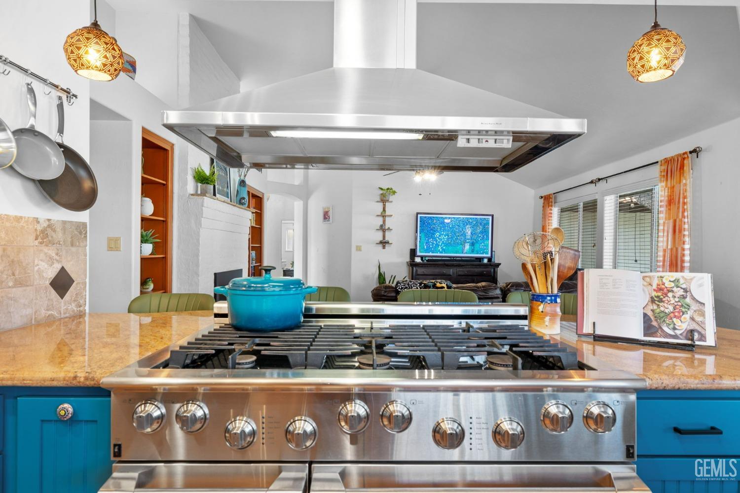 Undisclosed Address Bakersfield, CA 93311 - Photo 33 of 69 a stove top oven sitting inside of a kitchen
