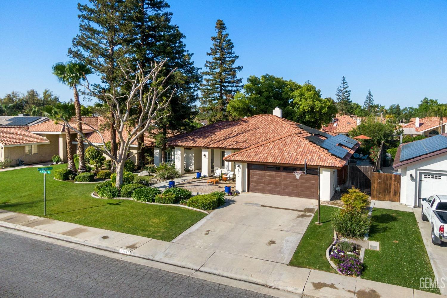 Undisclosed Address Bakersfield, CA 93311 - Photo 4 of 69 a house view with a garden space