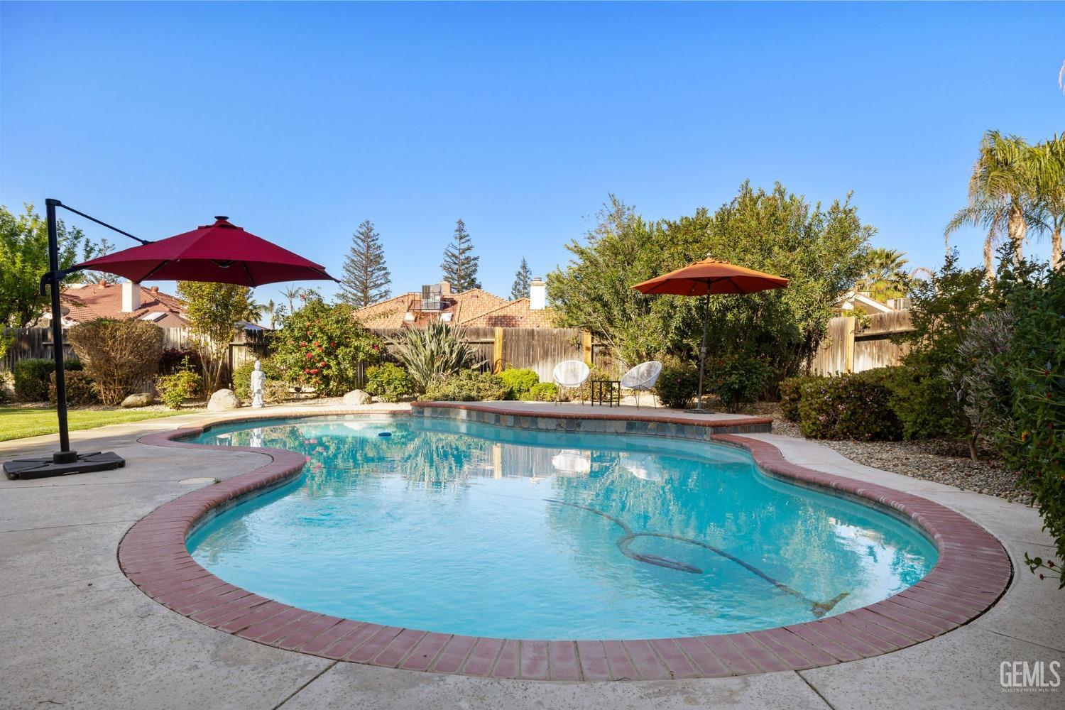 Undisclosed Address Bakersfield, CA 93311 - Photo 55 of 69 a view of a swimming pool with an outdoor seating