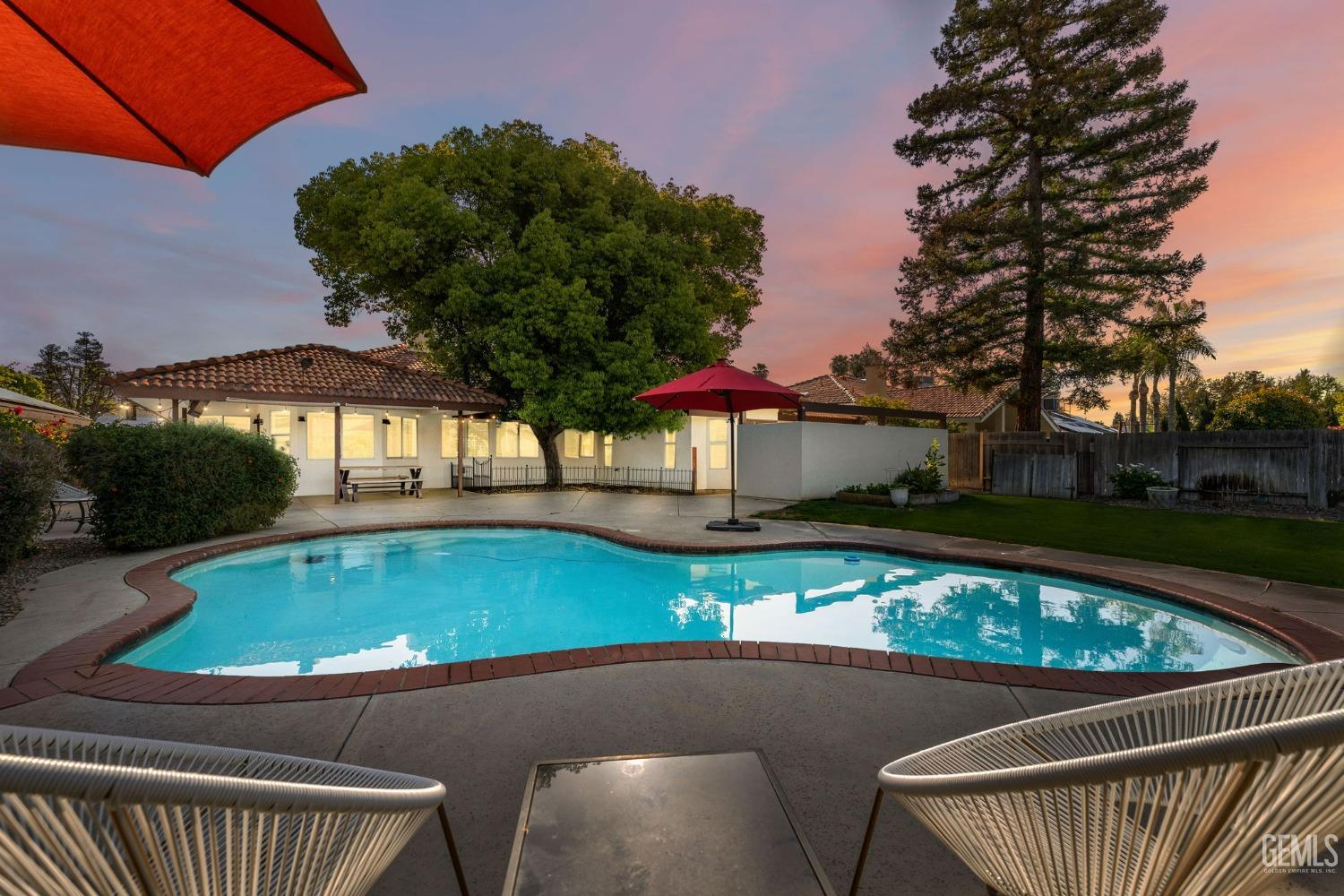 Undisclosed Address Bakersfield, CA 93311 - Photo 60 of 69 a view of a swimming pool with a patio