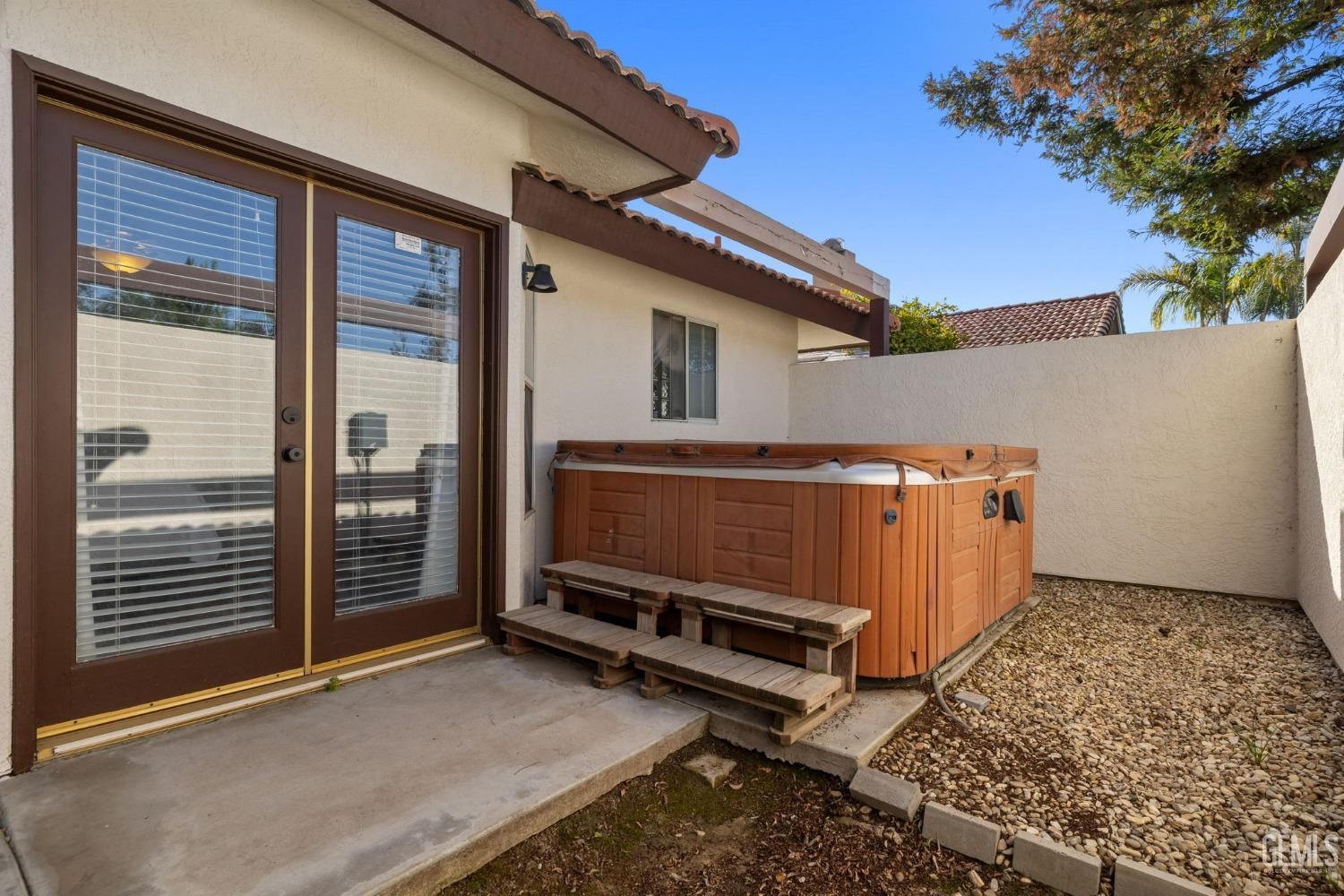 Undisclosed Address Bakersfield, CA 93311 - Photo 64 of 69 a backyard of a house with barbeque oven fire pit and outdoor seating