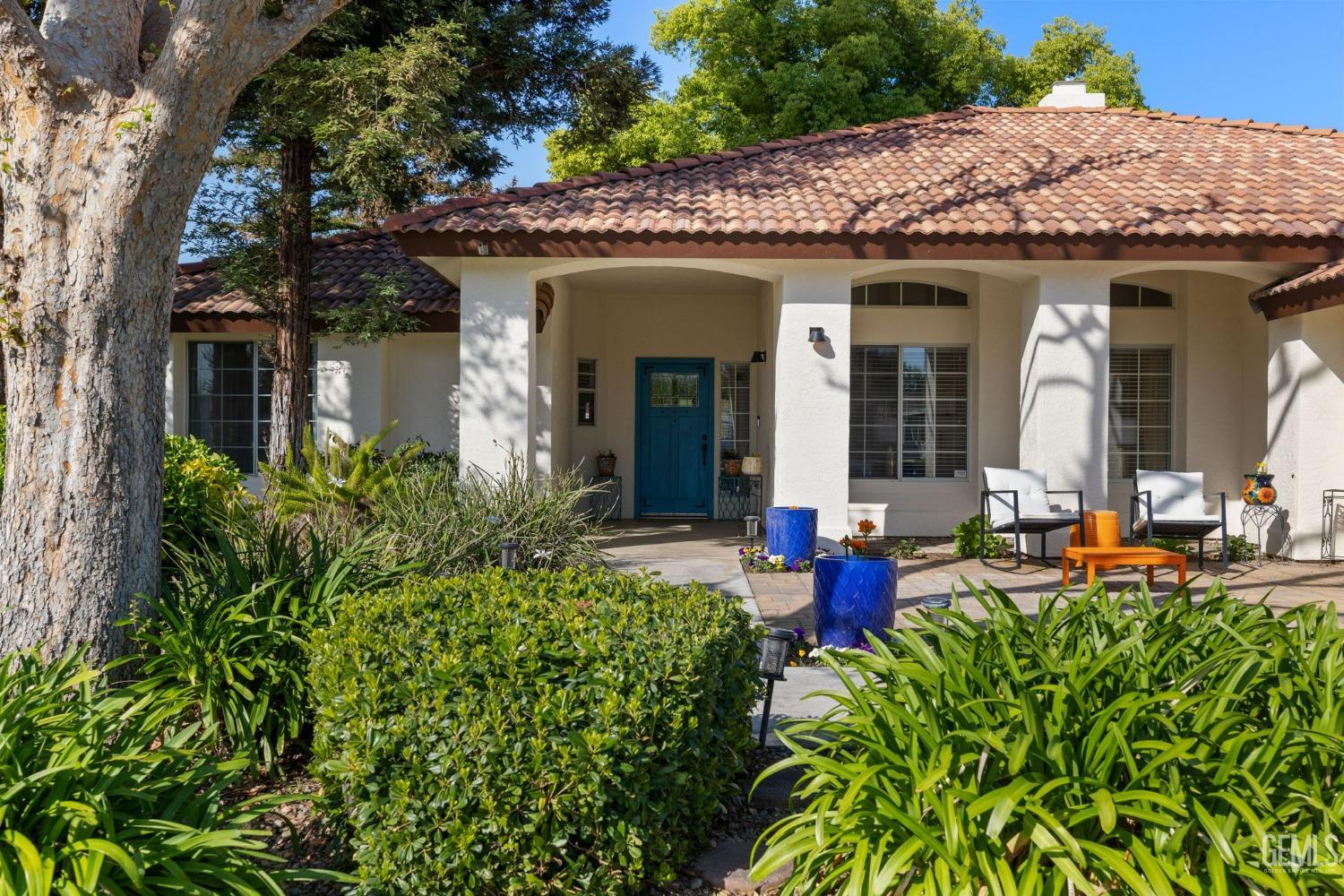 Undisclosed Address Bakersfield, CA 93311 - Photo 9 of 69 front view of a house with a patio
