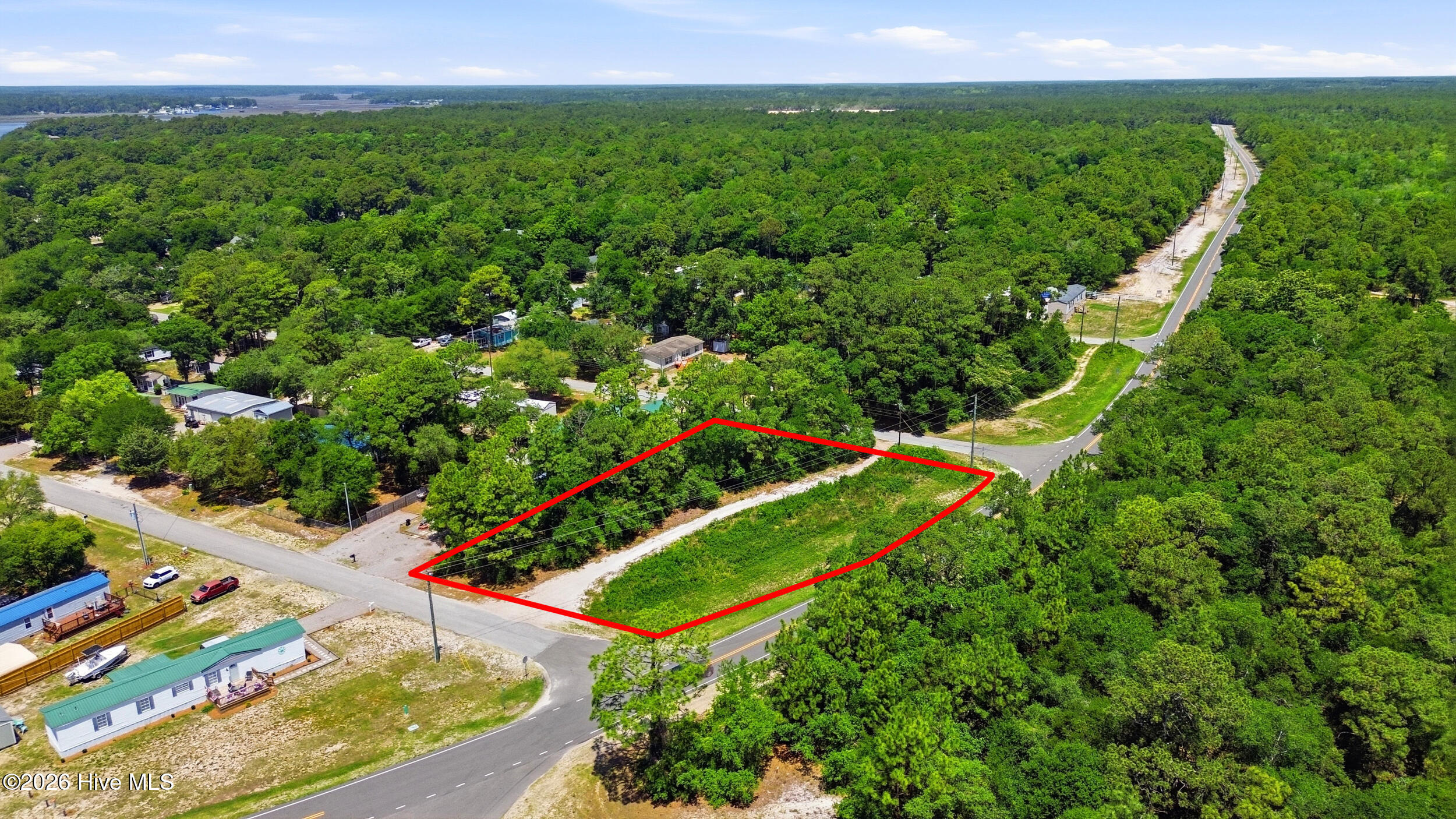 3605 Sunset Harbor Road Southeast Bolivia, NC 28422 - Photo 1 of 19 3605 _sunset_harbor_rd_001-lines