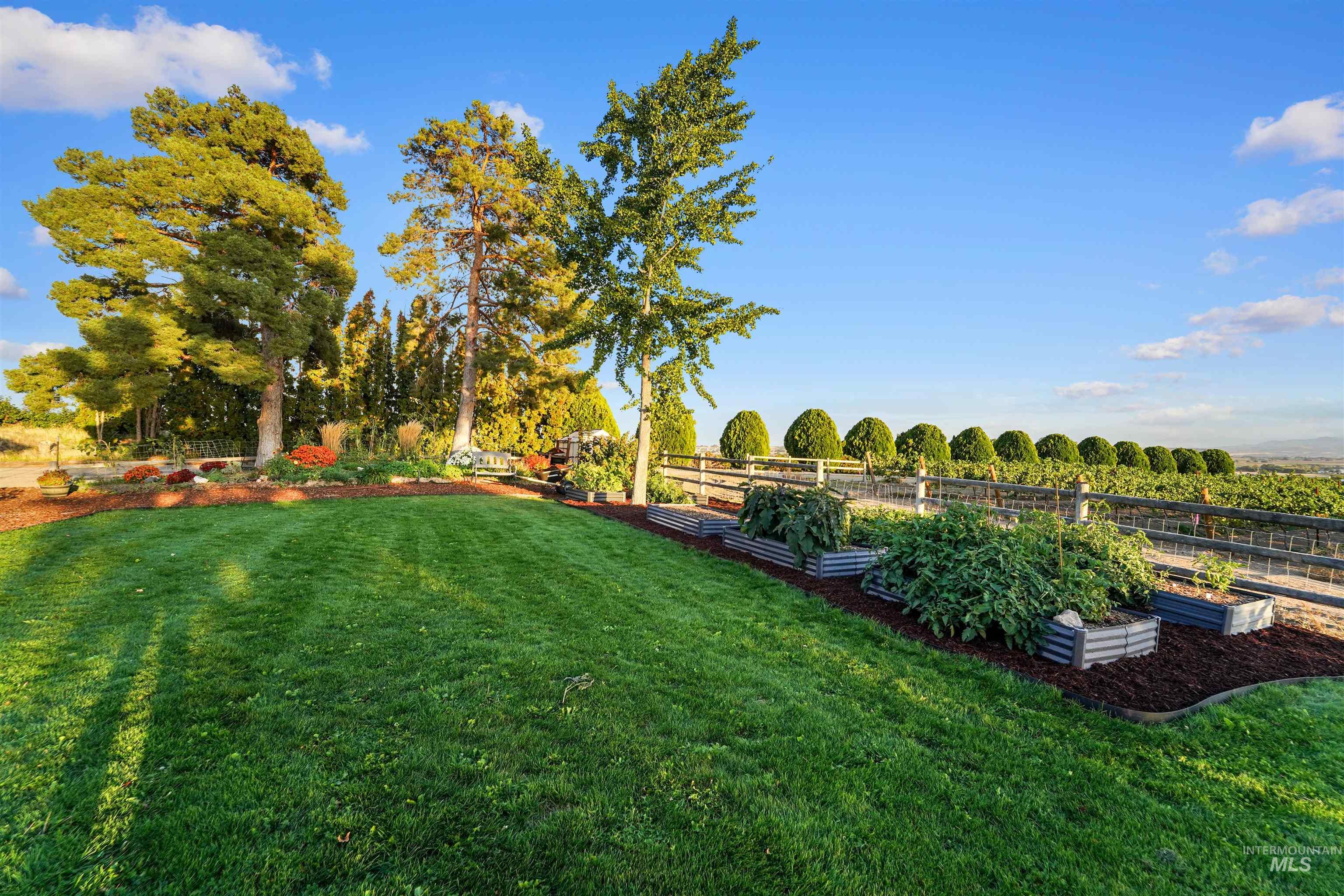 12730 Sunny Slope Road Caldwell, ID 83607 - Photo 49 of 50 View of yard featuring a garden