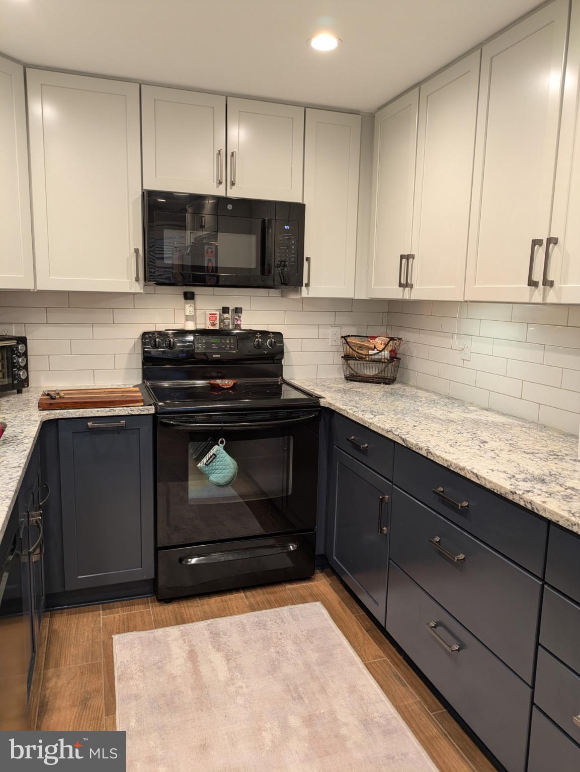 17636 Kohlhoss Road Poolesville, MD 20837 - Photo 6 of 6 Modern kitchen with sleek finishes.
