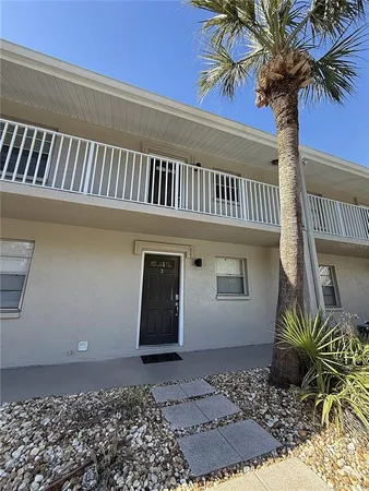 a view of a hallway with entryway