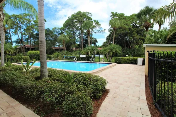 a view of a garden with basketball court